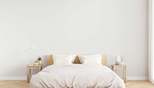 Minimal-bedroom-wall-mock-up-with-wooden-side-table-on-wooden-floor.